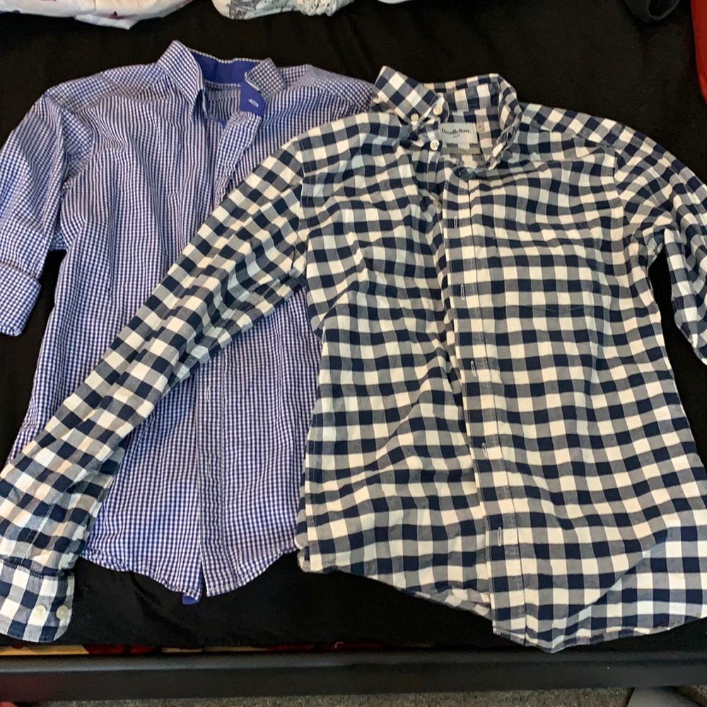 2 small men’s plaid collared work shirts.